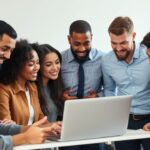 Menschengruppe am Laptop